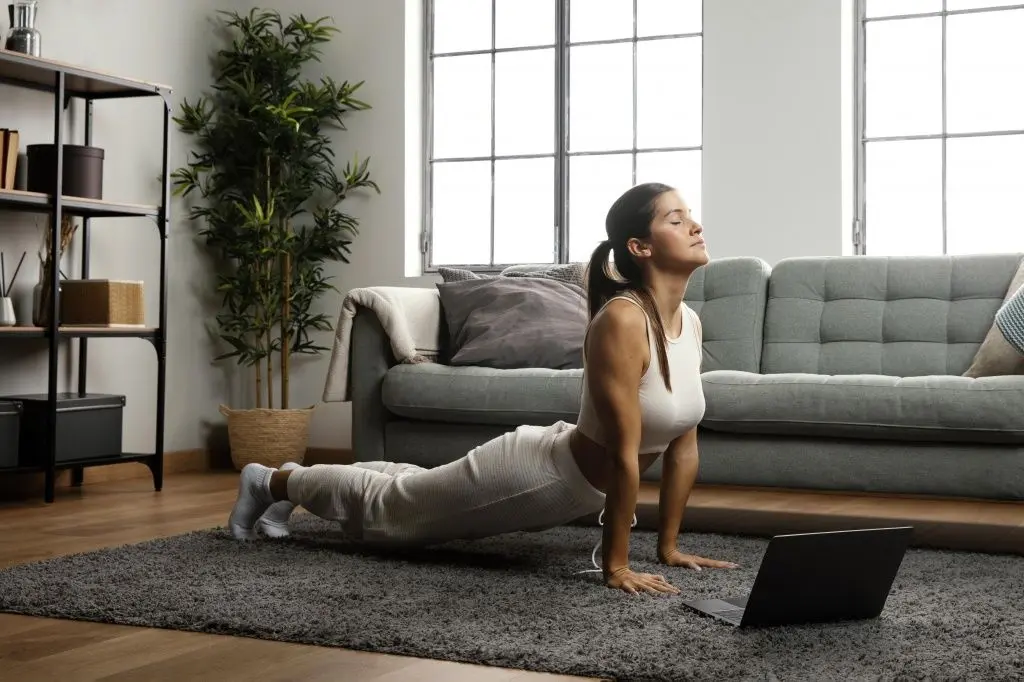 long-shot-woman-practicing-yoga.jpg