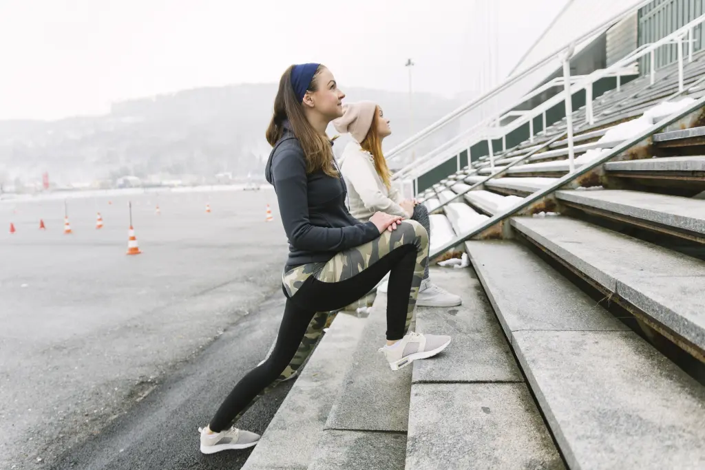 side-view-two-women-working-out-winter.jpg